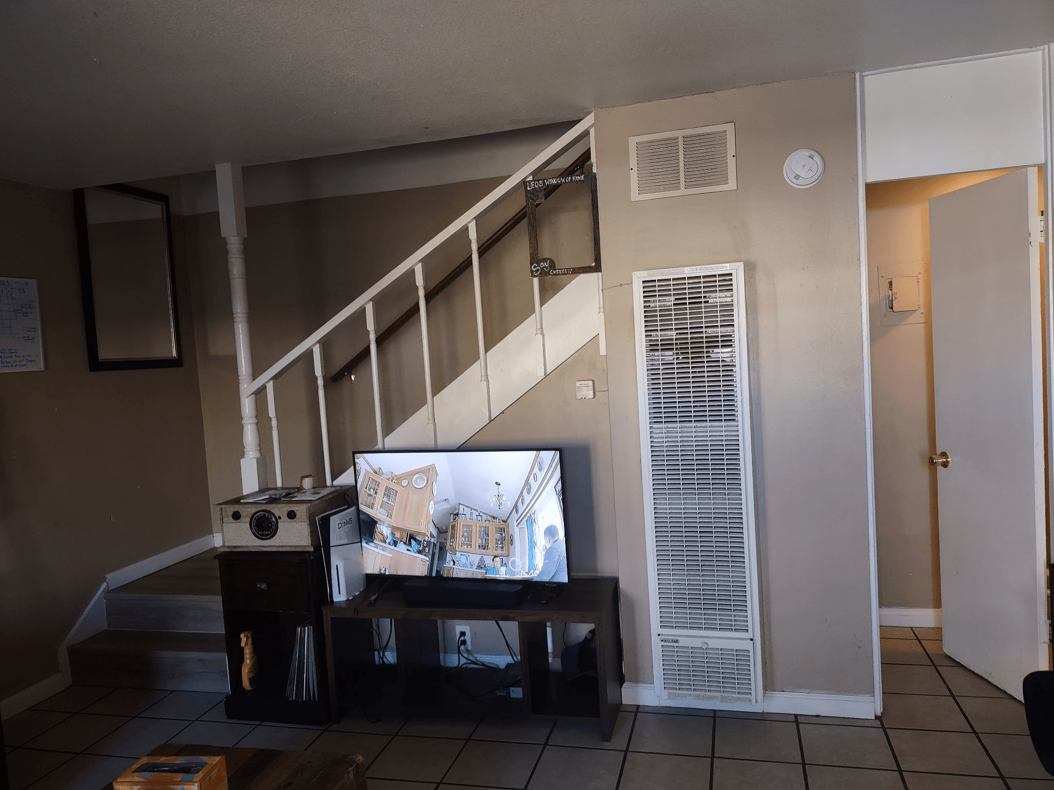 Living room & stairs — Unit D